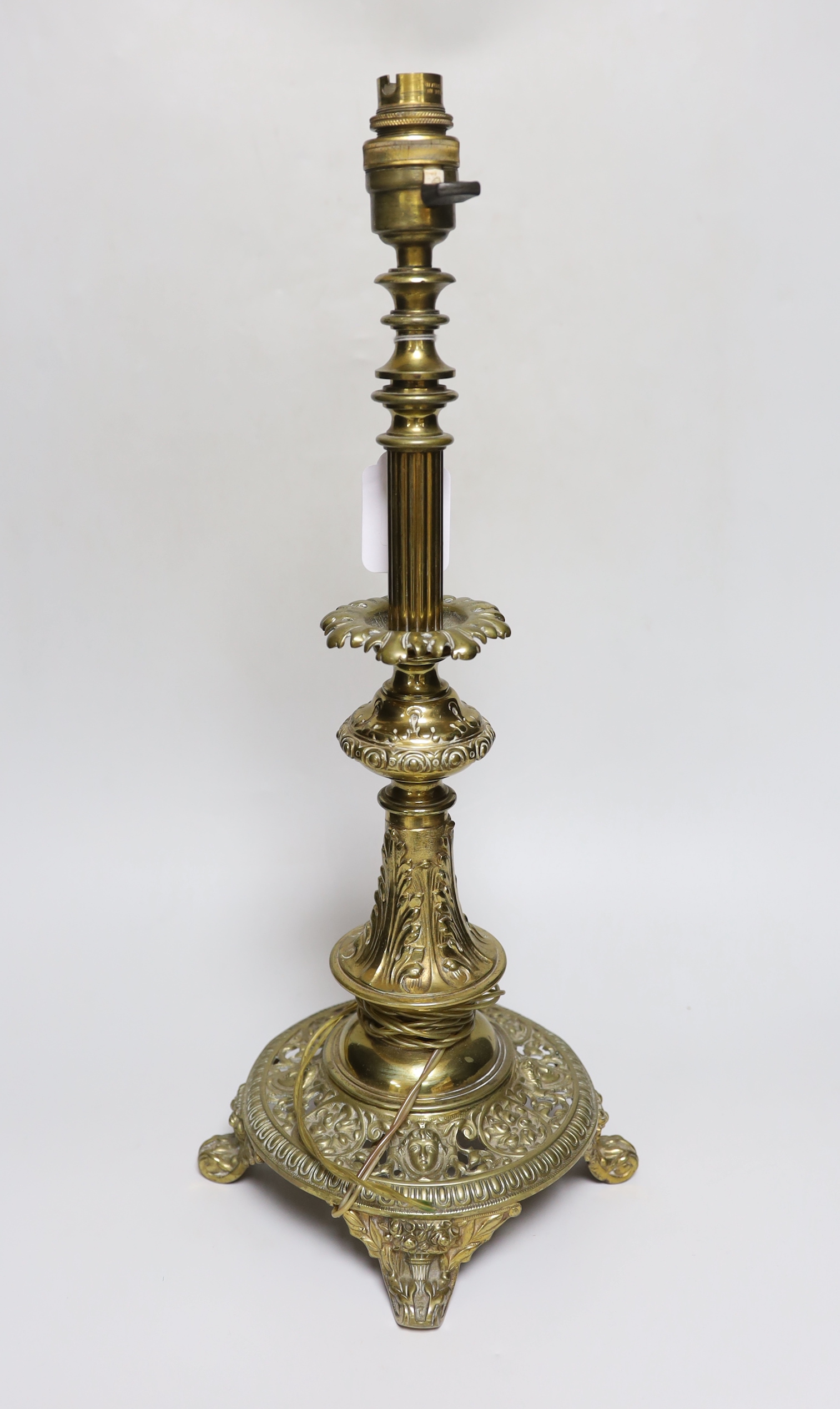 A pierced brass table lamp